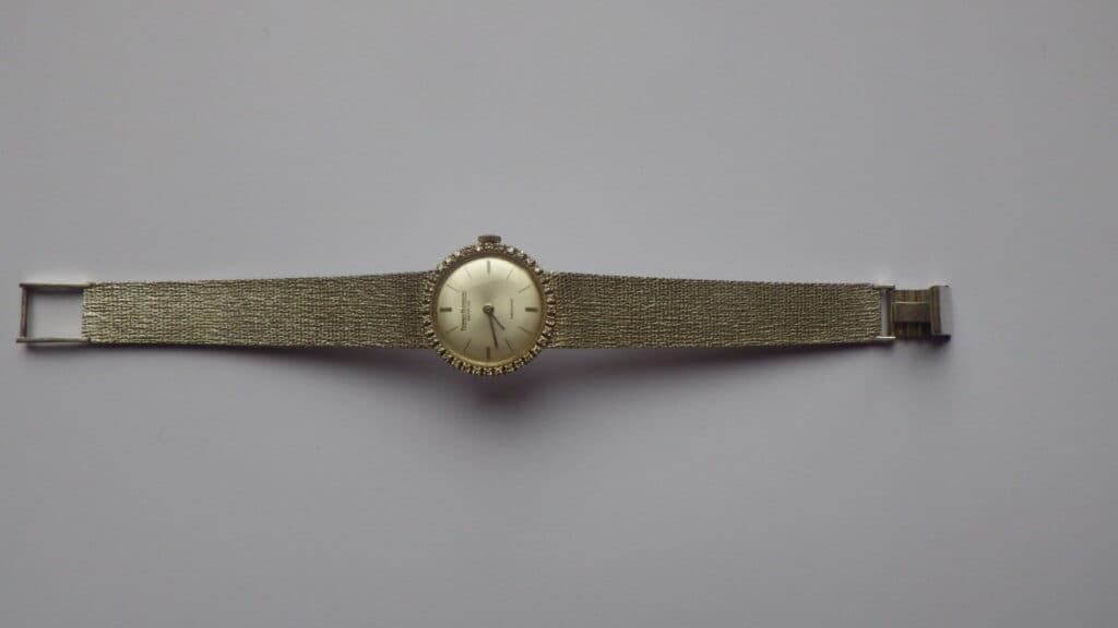 Stima del valore di un orologio di lusso Berney-Blondeau in oro bianco e diamanti